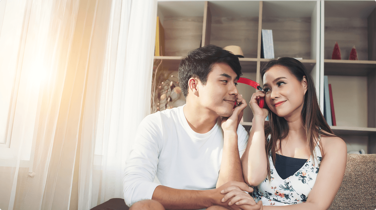 Couple sharing a moment in a cozy living room
